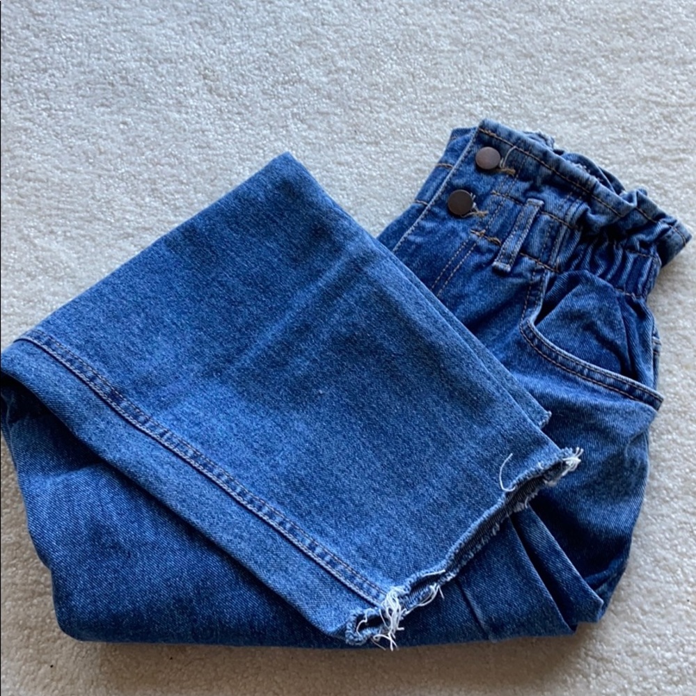 High waisted blue jeans
